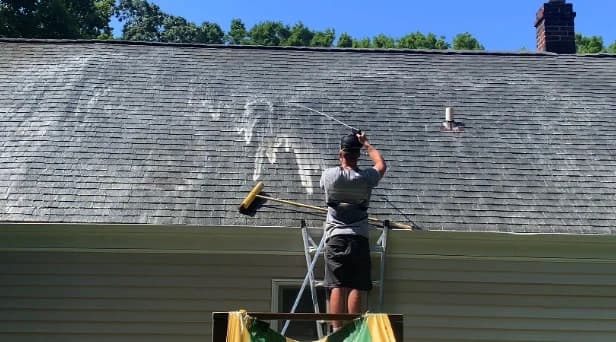 Before and after results of roof washing by Cuyahoga Falls Power Washing in Cuyahoga Falls